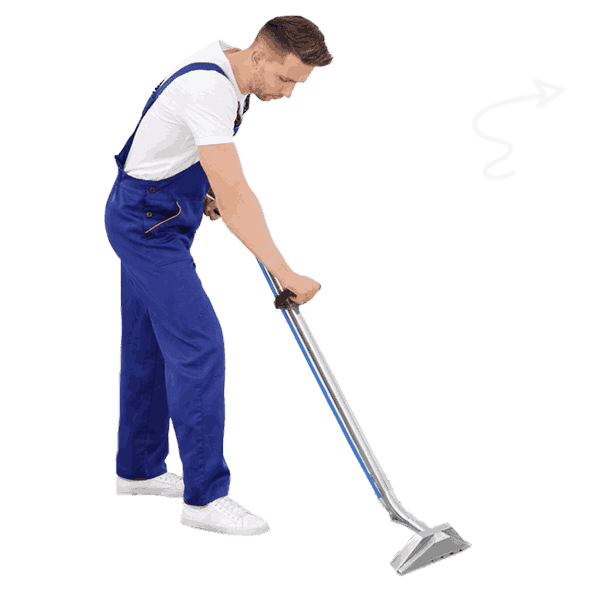 Man standing while cleaning a carpet with professional equipment